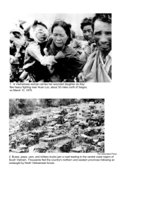 1. A Vietnamese woman carries her wounded daughter as they flee